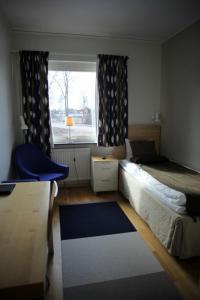 Letto o letti in una camera di Hotell Åsen