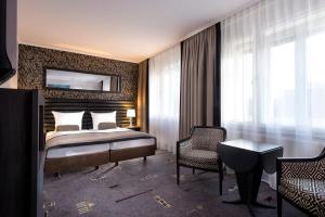 Postel nebo postele na pokoji v ubytování Park Hotel am Berliner Tor