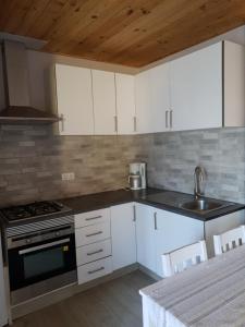 Kuchyň nebo kuchyňský kout v ubytování Casa Robion