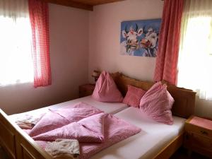 Łóżko lub łóżka w pokoju w obiekcie Villa Brandstätter