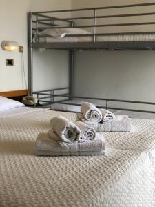 Postel nebo postele na pokoji v ubytování Hotel Artide