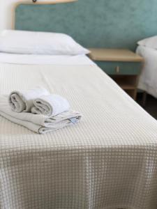 Postel nebo postele na pokoji v ubytování Hotel Artide