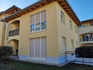 a house with blinds on the side of it at Klein und Fein in Rust