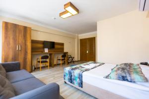 Giường trong phòng chung tại OLD TOWN BOUTIQUE HOTEL