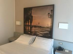 Postel nebo postele na pokoji v ubytování Hotel Principe Palace