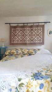 Ліжко або ліжка в номері La Casa Sugli Archi