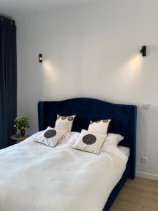 Posteľ alebo postele v izbe v ubytovaní Baltic Riviera Apartments - Granaria Riverside