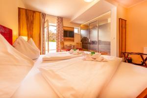 Panorama Hotel Traunstein客房内的一张或多张床位
