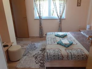 Postel nebo postele na pokoji v ubytování Rooms Luka