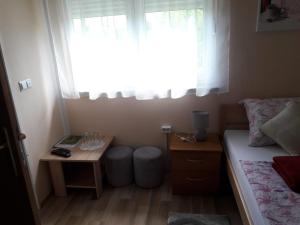Postel nebo postele na pokoji v ubytování Rooms Luka