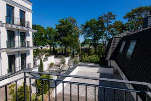 a view from the balcony of a building at Strandhotel Fontana in Timmendorfer Strand