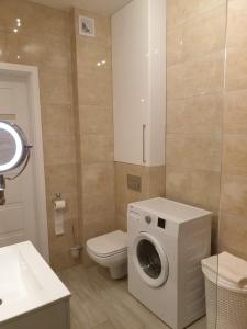 Ванна кімната в Apartament u Brydzi Apartt99