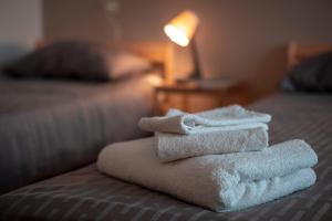 A bed or beds in a room at Civico 8 B&B - Appartamento