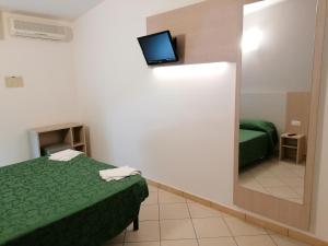 Postel nebo postele na pokoji v ubytování HOTEL ANDREA'S