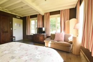 Postel nebo postele na pokoji v ubytování Hotel Ter Polders