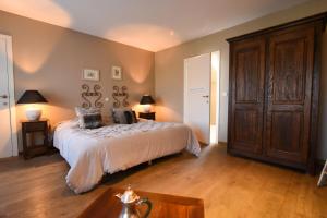 Postel nebo postele na pokoji v ubytování Hotel Ter Polders
