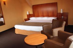 Postel nebo postele na pokoji v ubytování Hotel De Notelaer + 24 fotografií