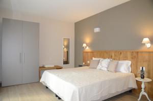 Giường trong phòng chung tại COSTA DEL GARDA - Lazise