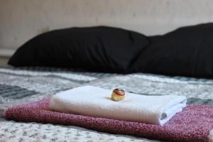A bed or beds in a room at Máté Pension