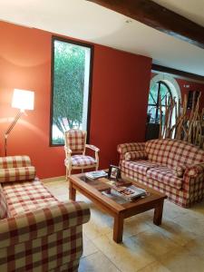Posezení v ubytování Hotel Restaurant Le Clos De Pradines