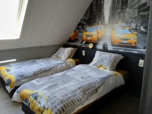 Ein Bett oder Betten in einem Zimmer der Unterkunft B&B Hoeven Het Gehucht