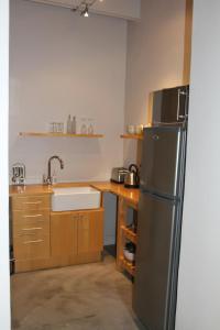 Aan De Vliet Guest House tesisinde mutfak veya mini mutfak