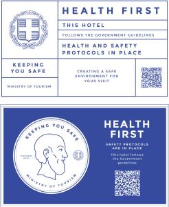 a health first logo and a health first coin at Hotel Pighi in Kriopigi