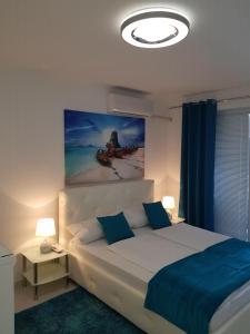 Postel nebo postele na pokoji v ubytování Apartman Katarina