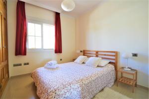 Posteľ alebo postele v izbe v ubytovaní Excepcional Duplex al lado de la playa y con vistas al mar