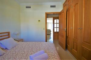 Posteľ alebo postele v izbe v ubytovaní Excepcional Duplex al lado de la playa y con vistas al mar