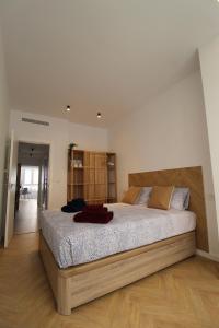A bed or beds in a room at Encanto en el centro de Alicante