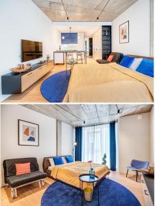 a bedroom with a large bed and a living room at HaPPy Inn GOLD Studio, self check-in, Parking in the underground garage in Vilnius