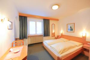 Letto o letti in una camera di Pension Panorama