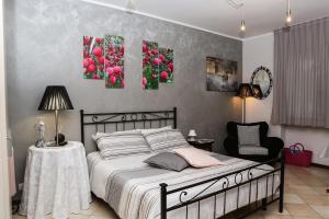 Postel nebo postele na pokoji v ubytování La casa di Ada