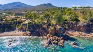 an aerial view of a rocky island in the water at Casa Bianca Rais Gerbi in Finale
