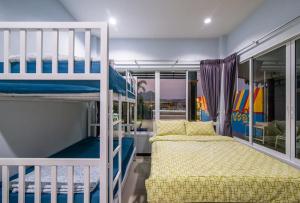 Ένα ή περισσότερα κρεβάτια σε δωμάτιο στο Lux9 Pool Villa Cha-Am
