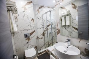 Koupelna v ubytování Stella boutigue rooms + 37 fotografií