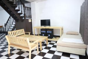 Μια τηλεόραση ή/και κέντρο ψυχαγωγίας στο Sam Resort Chaam