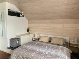 Postel nebo postele na pokoji v ubytování Apartments Hana Bled