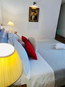 A bed or beds in a room at La Casa Di Ago