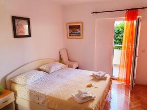 Postel nebo postele na pokoji v ubytování Guest House Antonia