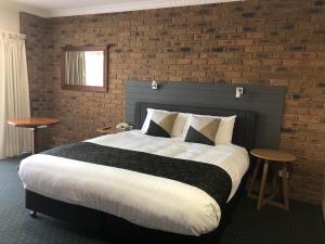 Travellers Rest Motor Inn Swan Hill客房内的一张或多张床位
