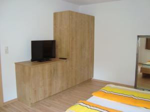 A television and/or entertainment centre at Haus Alexander