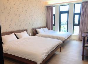 Letto o letti in una camera di 逸家民宿 Yija