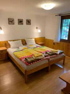 A bed or beds in a room at Borimechkova Kashta