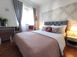 Posteľ alebo postele v izbe v ubytovaní Apartment Helena