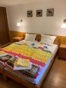 A bed or beds in a room at Borimechkova Kashta