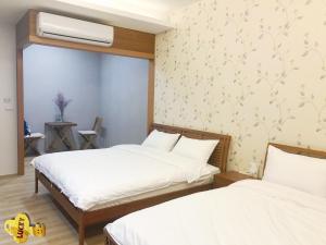 Letto o letti in una camera di 逸家民宿 Yija