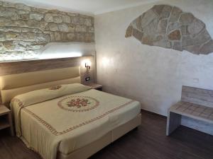 Postel nebo postele na pokoji v ubytování Hotel Internazionale