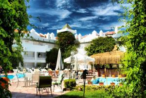 a view of a resort with a swimming pool at Hotel Golden Gate in Kusadası